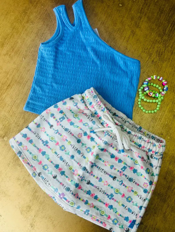 Conjunto Blusa Ombro Único e Short Saia Azul